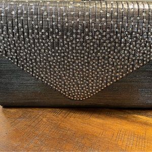 Very beautiful dressy handbag. Dark grey/silver with rhinestones.